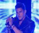 Baptiste Giabiconi interprète son single  LightYear  lors d'un showcase organisé dans le cadre du Festival annuel des jeunes créateurs de mode, à Dinard, vendredi 6 mai.  