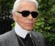 Karl Lagerfeld, photographié le 28 avril 2011 à Paris, a fait de Baptiste Giabiconi sa muse.