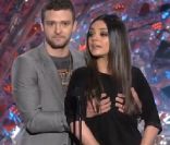 Mila Kunis et Justin Timberlake se pelottent avec humour lors des 20e MTV Movie Awards, à Los Angeles, le 5 juin 2011.