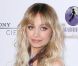 Nicole Richie, enceinte de trois mois, assiste à une levée de fonds pour l'Unicef. Une grossesse invisible sous cette longue robe. Los Angeles, le 23 Mars 2009.