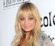 Même enceinte de huit mois, Nicole Richie ne s'arrête jamais de travailler. Lancement de sa ligne de vêtements de maternité, à Los Angeles, le 6 août 2009.