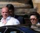 Le 29 juillet 2011, Mike Tindall et la princesse Anne quittent l'église qui abritera la mariage du jeune homme avec Zara Phillips le lendemain. 