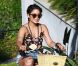 Vanessa Hudgens tente de garder le sourire malgré son nouveau visage qui lui déplaît, à Los Angeles, le dimanche 24 juillet 2011.