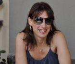 Le premier ministre britannique David Cameron et son épouse Samantha profitent de quelques jours de vacances en Italie, le 31 juillet 2011 : ils boivent un café à Montevarchi, près de Sienne. 