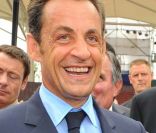 Nicolas Sarkozy et son fils Louis, à Pékin, le 8 août 2008. 
