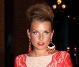 Coleen Rooney, délicieuse dans sa robe tout en discrétion le 23 octobre au Wing's Chinese Restaurant de Manchester
