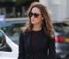 Pippa Middleton en blazer à col chale noir, robe Zara et sac Modalu. Londres, le 10 octobre 2011. 