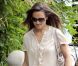 Son léger chemisier et son slim J Brand auraient pu constituer une tenue parfaite si Pippa Middleton n'avait pas choisit ses bottes marrons. Londres, le 20 mai 2011. 