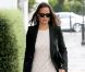 Pippa Middleton réalise un fashion faux pas dans son fameux blazer noir, porté sur une robe en dentelle H&amp;M et des bottes Aquitalia by Marvin K. Londres, le 6 septembre 2011. 