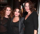 Mademoiselle Agnès, Emma de Caunes et Zoé Félix lors de la soirée shopping party de H&M pour le lancement de la collection Versace. Le 16 novembre 2011<br />