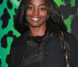 Aïssa Maïga ﻿﻿lors de la soirée  shopping party de H&M pour le lancement de la collection Versace. Le  16 novembre 2011