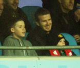 David Beckham et ses trois fils, Brooklyn, Romeo et Cruz, le 8 janvier 2012 à Manchester lors de la victoire de United sur City (3-2).