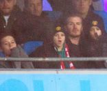 David Beckham et ses trois garçons, Brooklyn, Romeo et Cruz, le 8 janvier 2012 à Manchester lors de la victoire de United sur City (3-2).