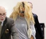 Pamela Anderson à la sortie de l\'avion le 26 janvier à Los Angeles