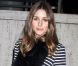La superbe Olivia Palermo brille lors du défilé Tibi avec une veste et une blouse en soie de la marque, un slim brut et des escarpins nude. New York, le 11 février 2012.