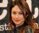 Olga Kurylenko en avril 2010 à Paris.
