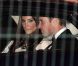 Le prince William et sa femme Catherine le 8 mai 2012 à la sortie du Claridges de Londres après la soirée mensuelle du Thirty Club. Le futur roi d'Angleterre devait prononcer une allocution. Kate Middleton a fait sensation dans une robe Roland Mouret et chaussée de Jimmy Choo.