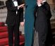 Carla Bruni dans la robe Lombard de Roland Mouret, dans sa teinte bleu canard originale, lors du dîner d'Etat donné à l'Elysée le 2 mars 2010 en l'honneur du président russe Dmitry Medvedev et sa femme Svetlana. Une robe qui a fait jaser, en raison de l'absence de soutien-gorge dessous...