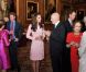 Kate Middleton en grande discussion avec l'ex-roi Siméon de Bulgarie, pendant que le prince Harry divertit la grande-duchesse Maria Teresa de Luxembourg. La reine Elizabeth II accueillait à déjeuner à Windsor, pour son jubilé de diamant, les souverains de 26 pays, le 18 mai 2012. Possiblement le plus grand rassemblement de têtes couronnées depuis le couronnement de la monarque en 1953.
