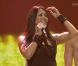 Anggun aux côtés de Jérémy Maupilet, ancien candidat de l'émission  Dilemme,  répète sa chanson  Echo (You and I)  pour l'Eurovision à Baku, mai 2012.