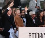Le prince Albert et la princesse Charlene au traditionnel défilé de mode caritatif des pilotes de F1 en marge du Grand Prix de Monaco, le 26 mai 2012 à l\'Amber Lounge.