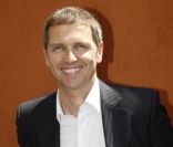Thomas Hugues pose à Paris, dans les coulisses du tournoi de Roland-Garros, le mardi 29 mai 2012.