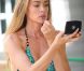 Denise Richards se maquille avant une séance photo, à Encino le 4 juillet 2012