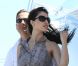 Eric Besson et son épouse Yasmine sur un yacht au large de Saint-Tropez, le 12 juillet 2012.