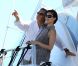 Eric Besson et son épouse Yasmine à bord d'un yacht au large de Saint-Tropez, le 12 juillet 2012.