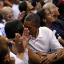 Michelle Obama et Barack Obama : Tendre baiser devant une foule en délire