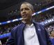 Barack Obama félicite l'équipe olympique féminine de basket qui a gagné un match contre le Brésil, à Washington, le 16 juillet 2012