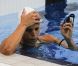 Laure Manaudou, frustrée après son élimination en série du 100 mètres dos le 29 juillet 2012 à l'Aquatics Center de Londres lors des Jeux olympiques 2012