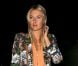 Maria Sharapova heureuse après avoir célébré sa médaille d'argent chez Zuma à Londres le 4 août 2012