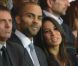 Tony Parker et sa compagne Axelle dans les tribunes du Parc des Princes le 11 août 2012 pour la rentrée du Paris Saint-Germain en Ligue 1, tenu en échec (2-2) par Lorient lors de la 1e journée de championnat.