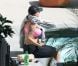 Amber Rose affiche des formes généreuses qu'elle tente de cacher alors qu'elle passe l'après-midi à son hôtel à Hollywood, Los Angeles, le 26 juillet 2012
