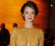 Charlotte le Bon s'apprête à assister au défilé Carven printemps-été 2013 dans l'enceinte du Grand Palais. Paris, le 27 septembre 2012.