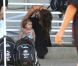Victoria Beckham, inséparable de sa fillette Harper, assiste à l'entraînement de foot de ses trois fils, le samedi 29 septembre 2012 à Los Angeles.