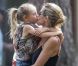 Heidi Klum assiste avec ses trois enfants Leni, Johan et Lou et son compagnon Martin Kristen au match de football de Henry, à Los Angeles, le 6 octobre 2012