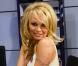 Pamela Anderson : Très décolletée pour dévoiler son secret de beauté...