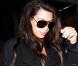 Kim Kardashian, enceinte : Comme Kanye West, elle insulte les photographes
