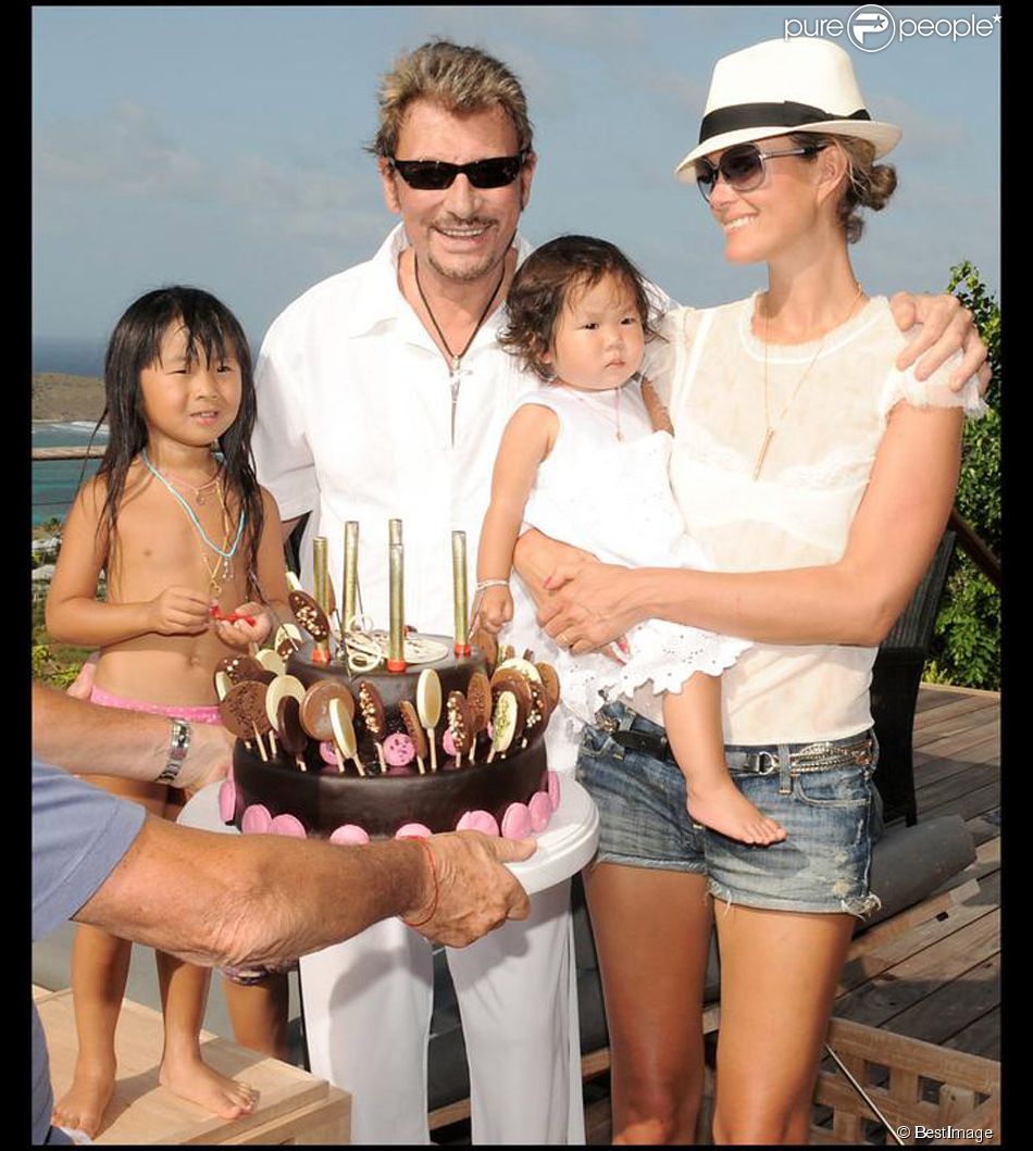 Johnny Hallyday et Laeticia avec leurs filles Jade et Joy à St Barth, le 13 août 2009