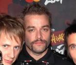 Christopher Wolstenholme (au centre) : papa pour la quatrième fois !