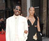Ike Turner avec une amie lors des Mojo Awards à Londres