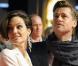 Costume de rigueur pour les amoureux : total blanc pour Angie, total noir pour Brad. Différents, mais toujours ensemble (Première allemande de Benjamin Button - 19 janvier 09)