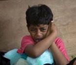 De retour à Mumbai, Azharuddin Ismael Mohammed qui joue Salim enfant dans Slumdog Millionnaire est giflé par son père - 27 février 2009