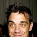 Robbie Williams prêt à se mettre en grève contre sa maison de production