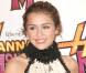 Miley Cyrus au cinéma Gaumont de Marignan sur les Champs Elysées à Paris pour la Première de "Hannah Montana"