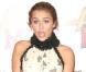 Miley Cyrus au cinéma Gaumont de Marignan sur les Champs Elysées à Paris pour la Première de "Hannah Montana"