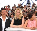  Le réalisateur Tsai Ming-Liang, Laetitia Casta, Yi-Ching Lu  au photocall de Visage le 23 mai 2009