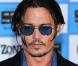 Johnny Depp, lors de l"avant-première hollywoodienne de "Public Enemies", au Mann"s Village Theatre de Westwood, à Los Angeles, le 23 juin 2009 !